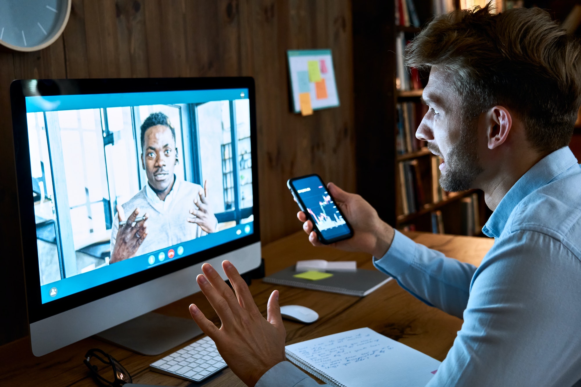 Caucasian financial advisor consulting african client on video conference call.